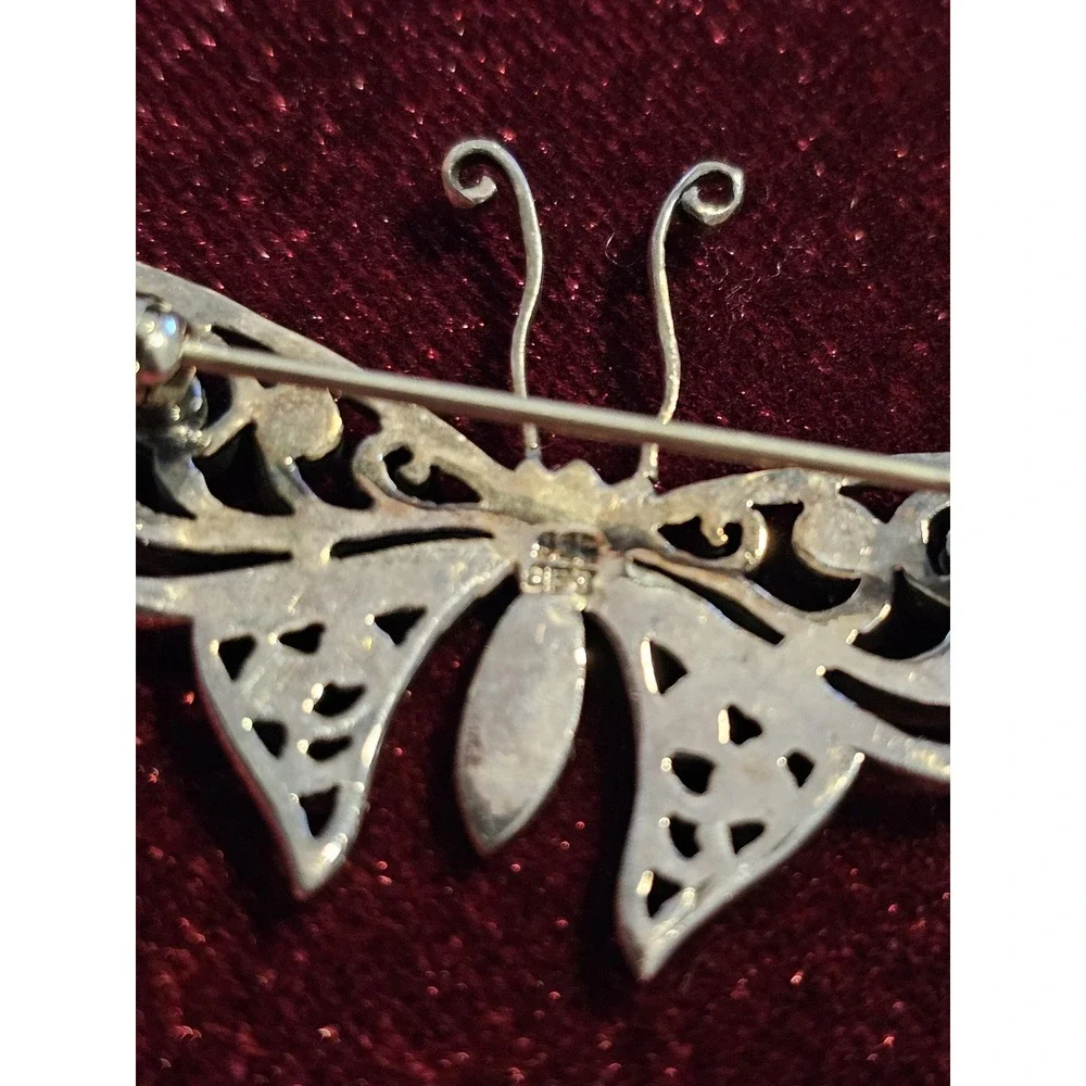 sterling butterfly pin. Marked 925 and hallmark CFT. About 1.5‎ brouch
